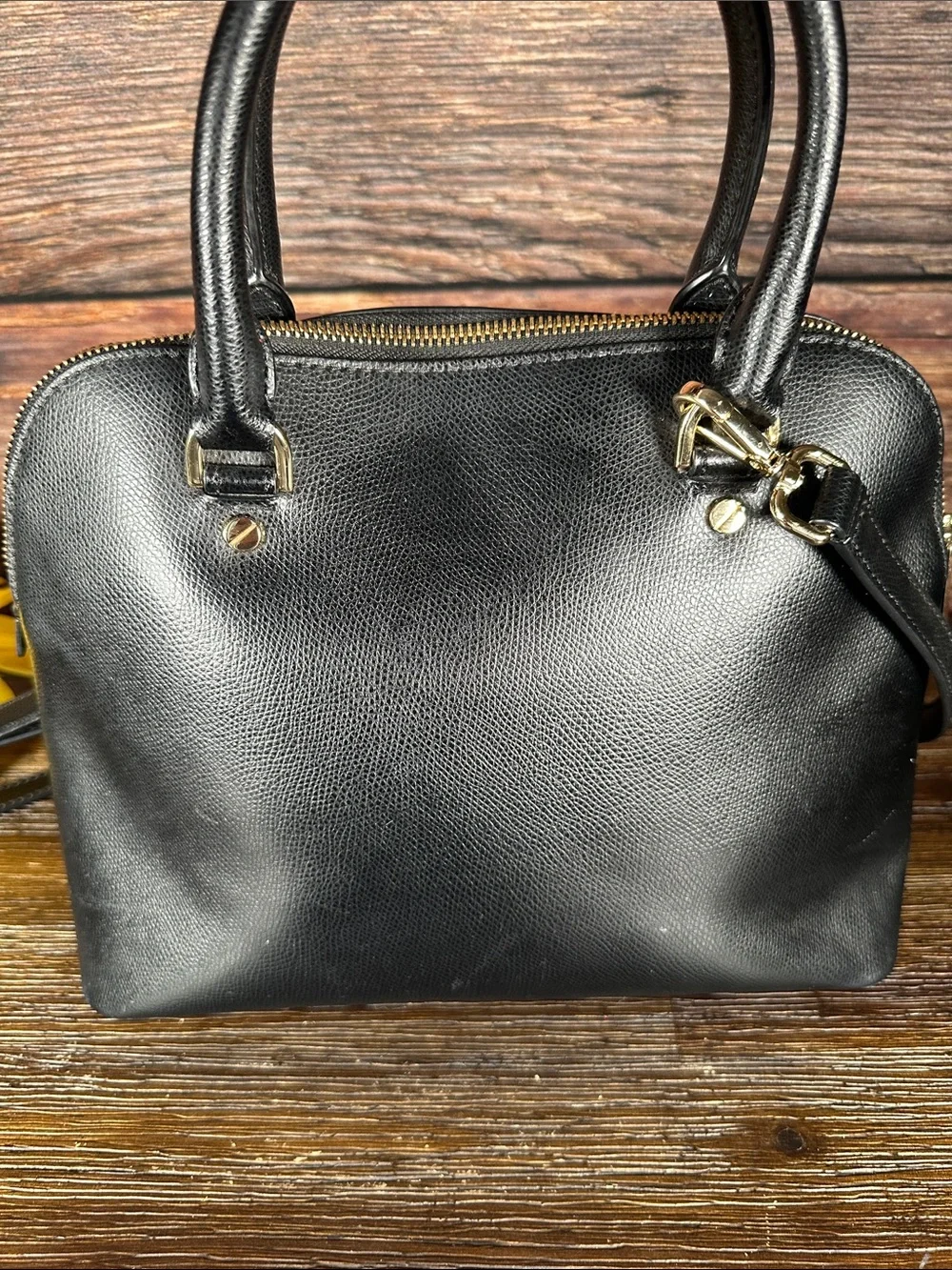 Michael Kors Cindy Medium Dome Satchel in leather with gold-tone hardware.